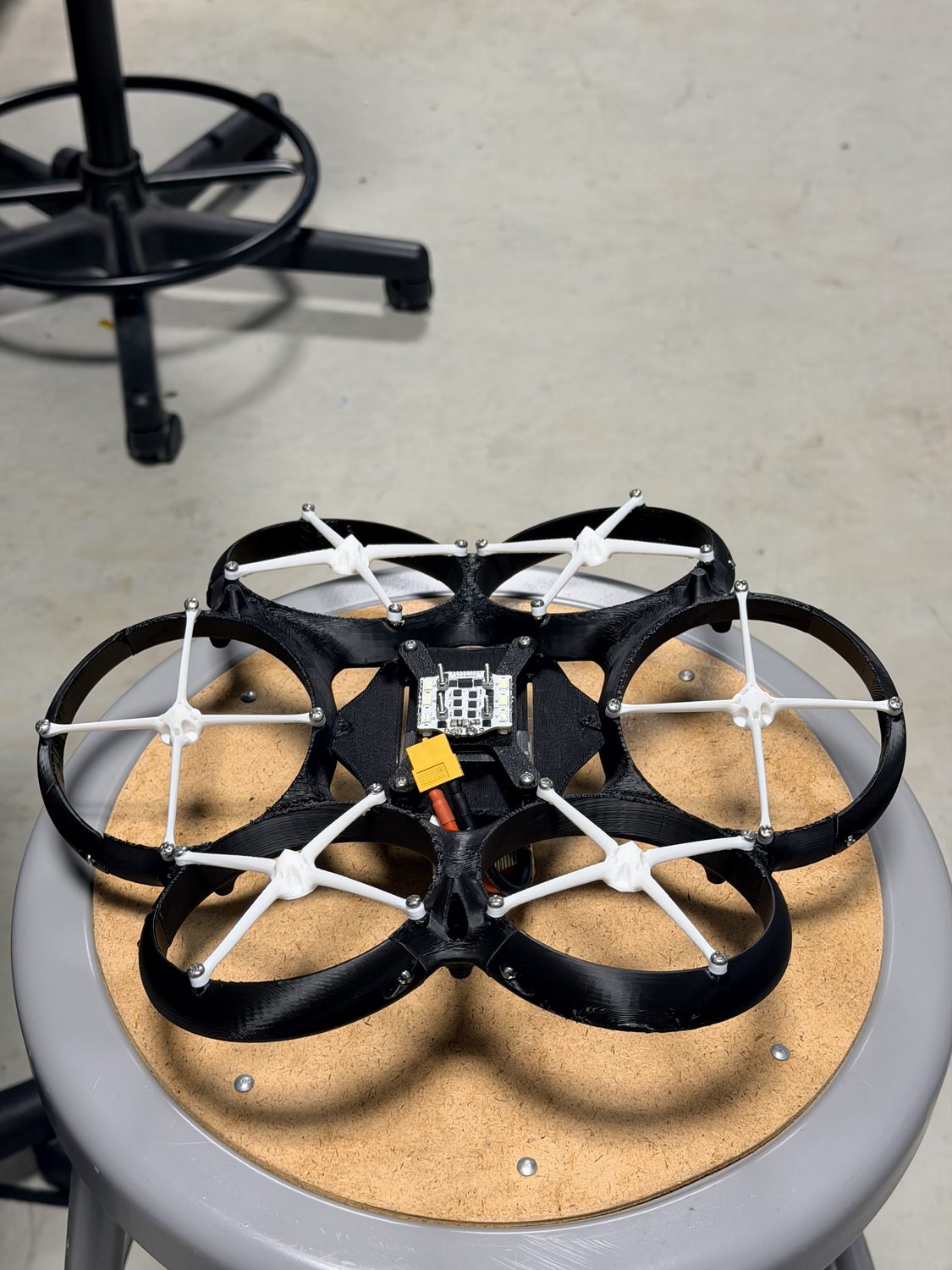 The drone airframe during the build, flight controller exposed